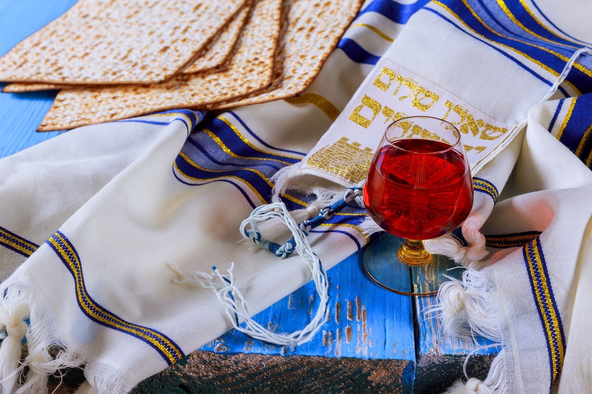 Matza and cup kosher wine on passover with Judaism tradishional religious jewish holiday